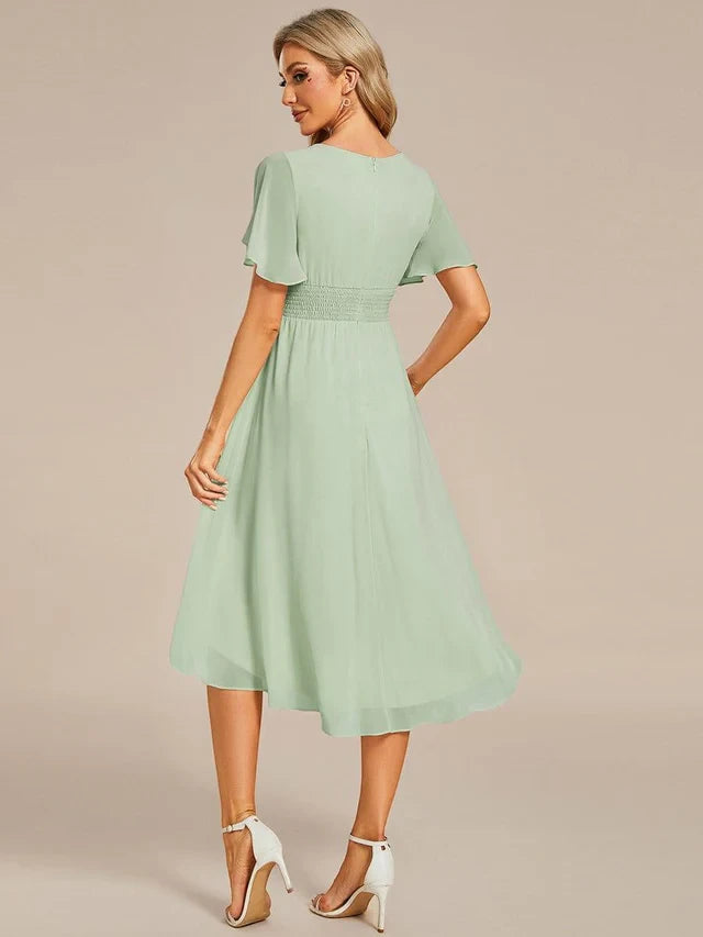 Women's Elegant Flowy Midi Wedding Guest Dress with Flutter Sleeves